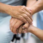 Elder Patient Helping Nurse Hand - Nursing Home Lawyer, Maryland
