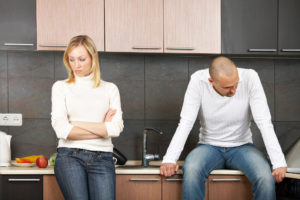 Divorce-Lawyer-Bridgeport-CT-upset-couple-standing-in-kitchen