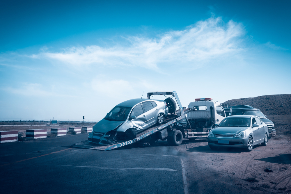 Proving Negligence in a Personal Injury Lawsuit - accident car on the tow truck